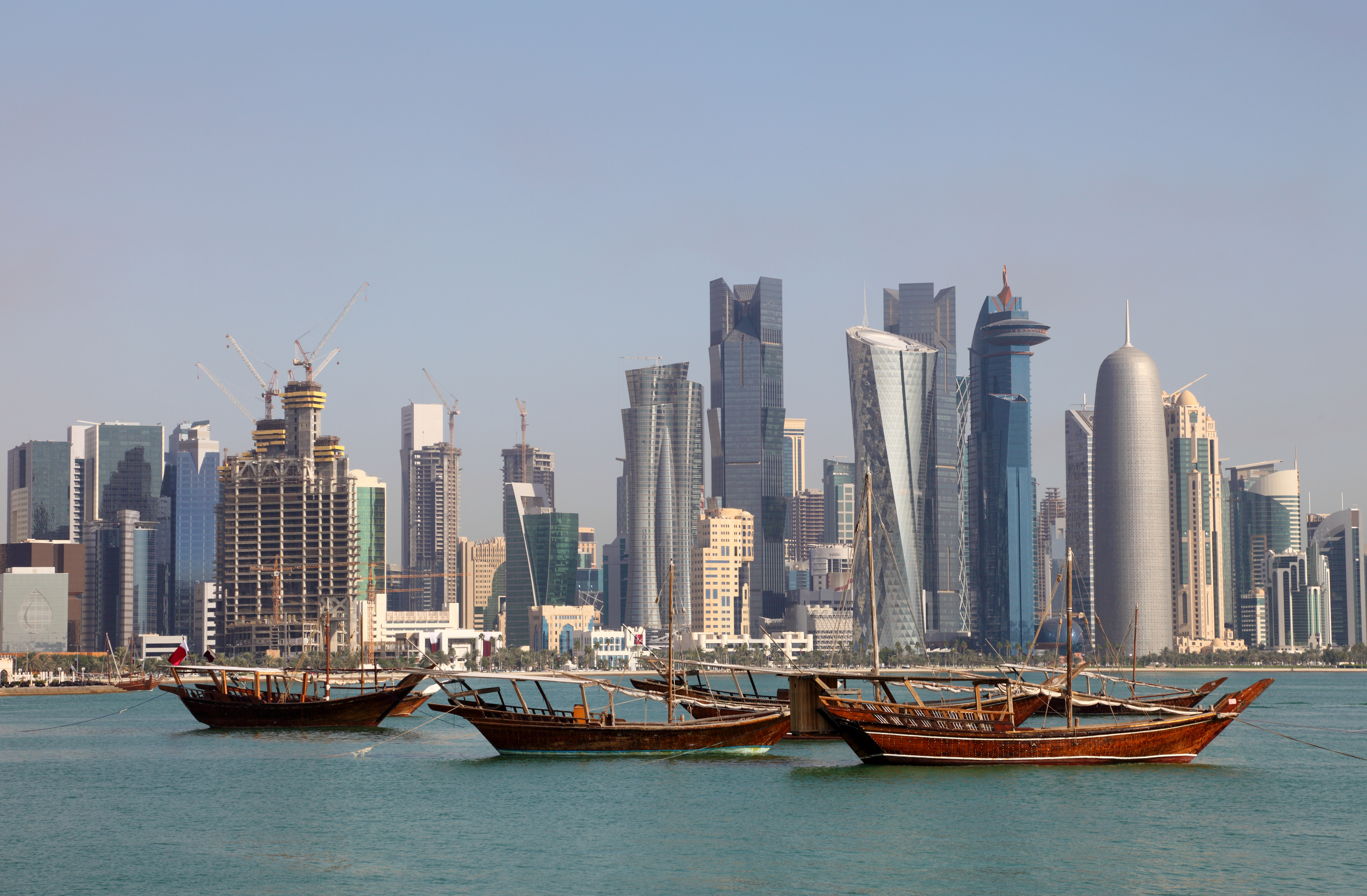 Skyline of Doha with traditional arabic dhows. Qatar, Middle East. Source: philipus/Fotolia